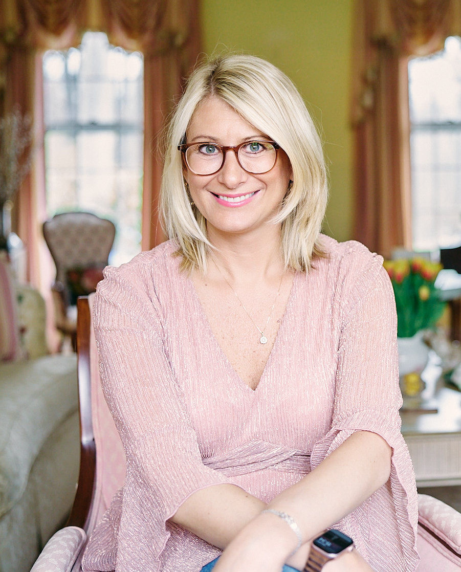 Ali Daggett seated in a living room